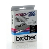 Brother TX-335 cassette à ruban 'extrême' 12 mm (d'origine) - blanc sur noir brillant
